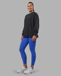 Woman wearing Cali FLXCotton Oversized Long Sleeve Tee - Black Washed | Model:Charlize | Size:XS | Thumbnail Index: 9