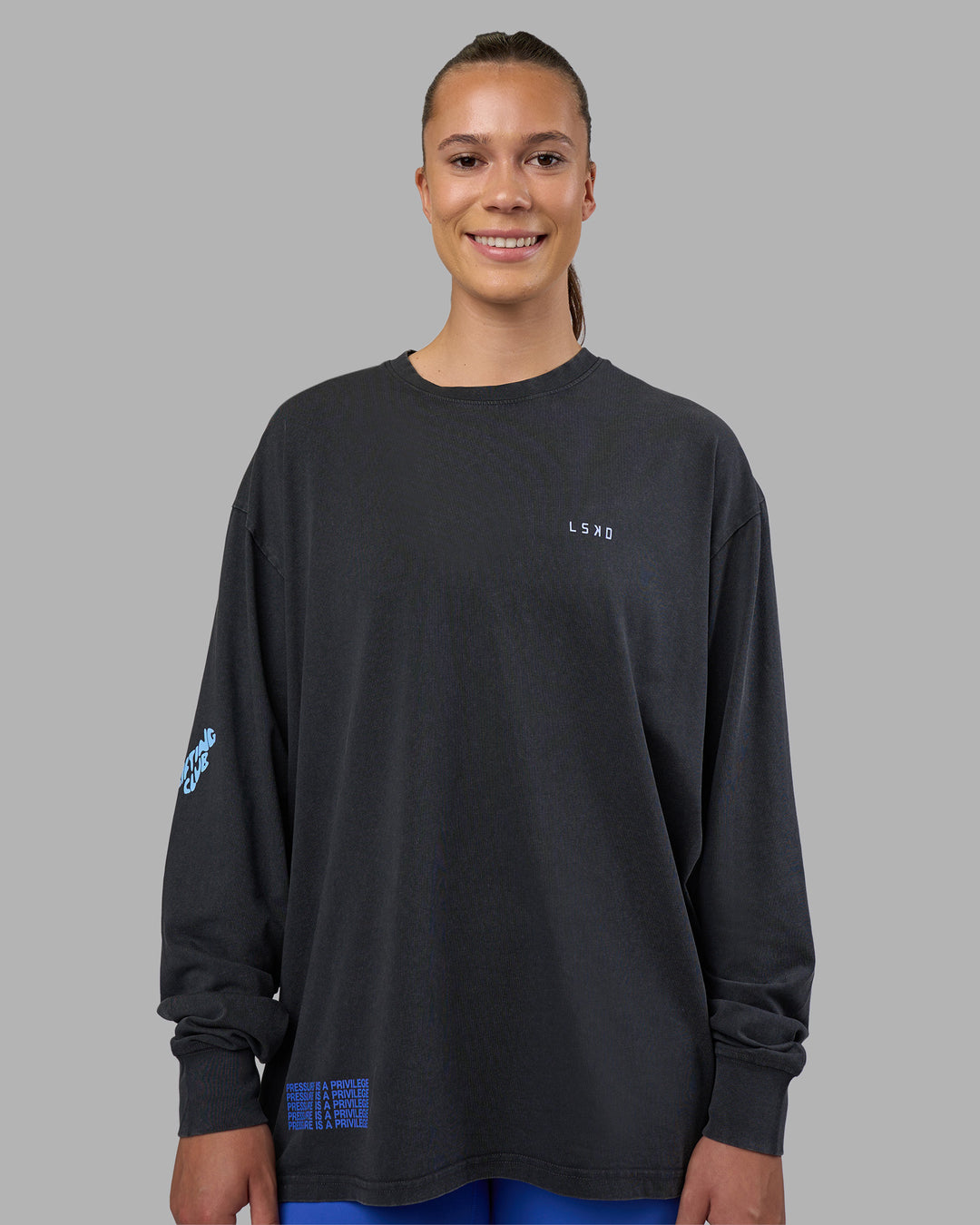 Woman wearing Cali FLXCotton Oversized Long Sleeve Tee - Black Washed | Model:Charlize | Size:XS - view 5