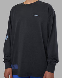Woman wearing Cali FLXCotton Oversized Long Sleeve Tee - Black Washed | Model:Charlize | Size:XS | Thumbnail Index: 11