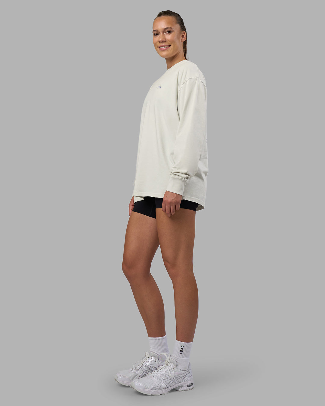 Woman wearing Cali FLXCotton Oversized Long Sleeve Tee - Digital Mist Washed | Model:Charlize | Size:XS - view 9