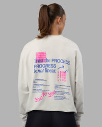 Woman wearing Cali FLXCotton Oversized Long Sleeve Tee - Digital Mist Washed | Model:Charlize | Size:XS | Thumbnail Index: 1