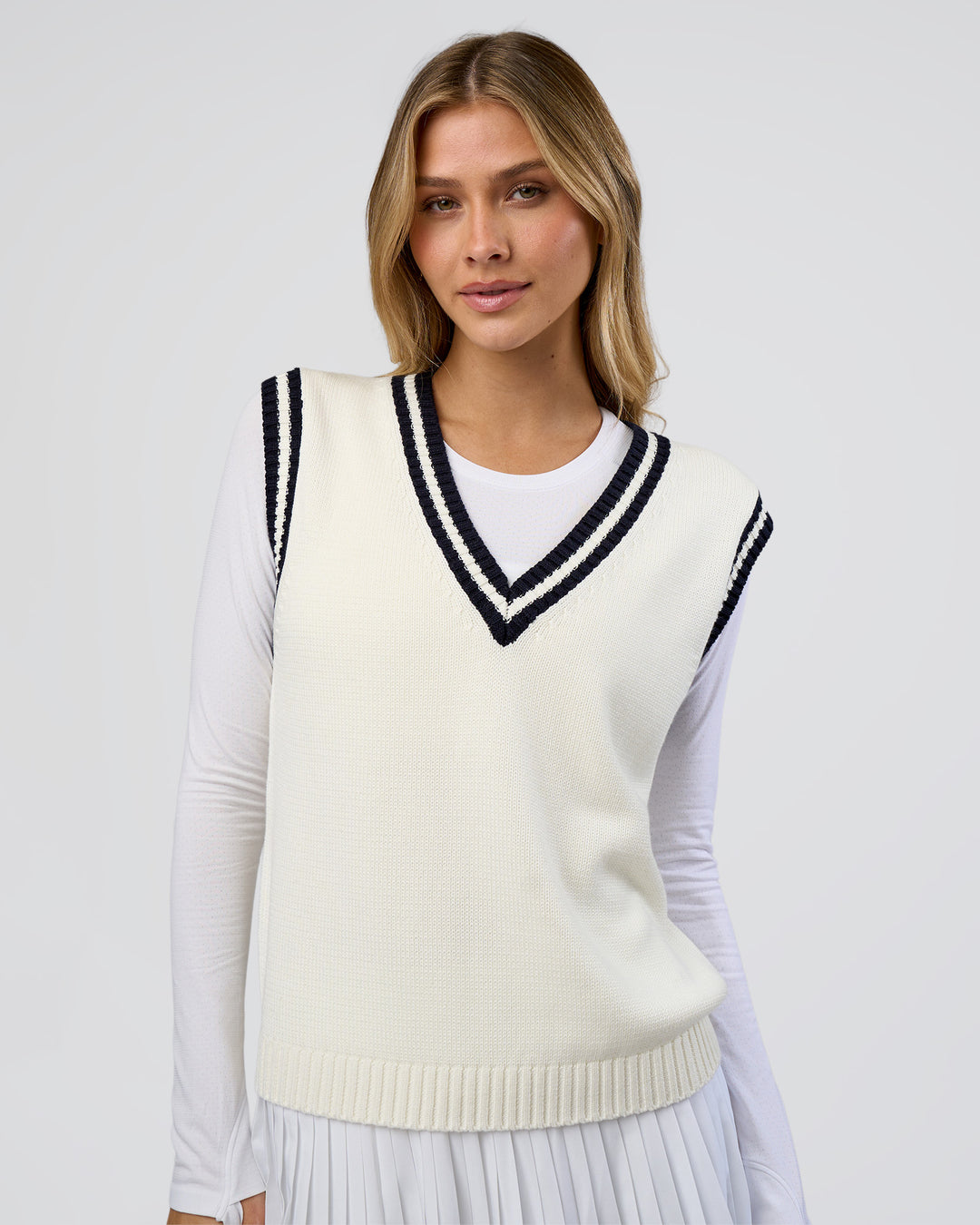 Woman wearing Clubhouse Vest - Off White-Future Navy | Model:Leilani | Size:XS - view 2