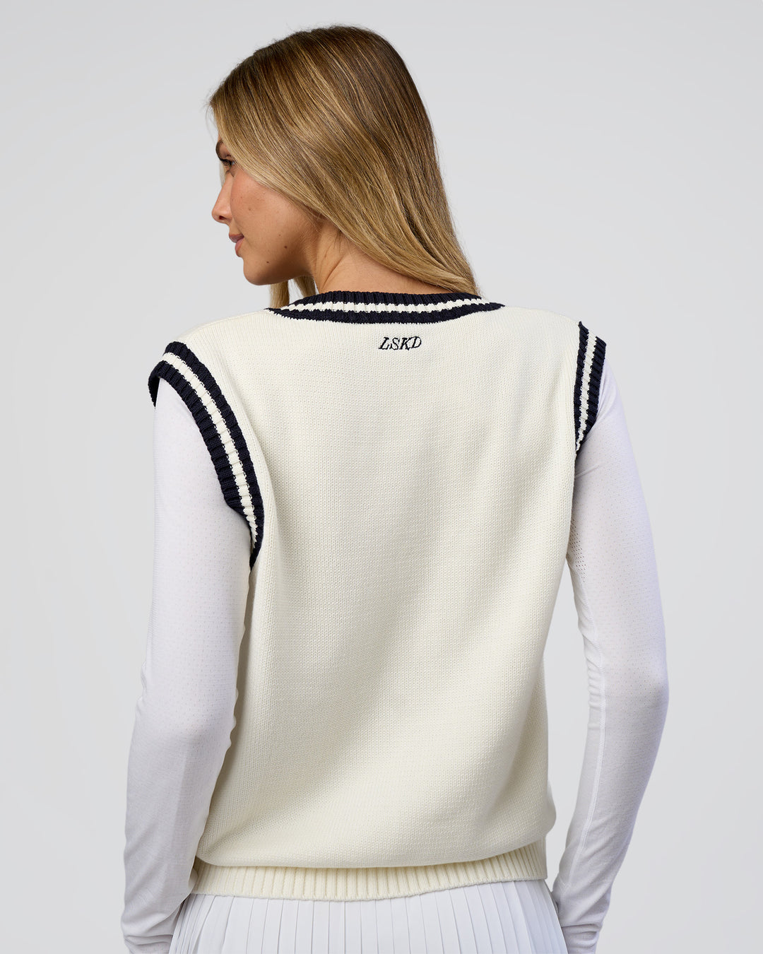 Woman wearing Clubhouse Vest - Off White-Future Navy | Model:Leilani | Size:XS - view 4