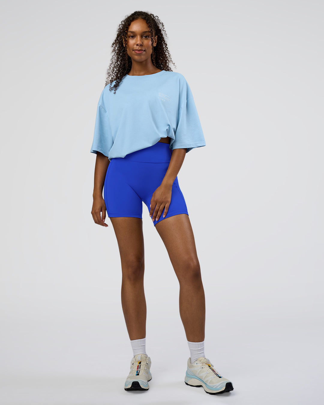 Woman wearing Coffee Run FLXCotton Oversized Tee - Open Air-White | Model:Jordan | Size:L - view 6