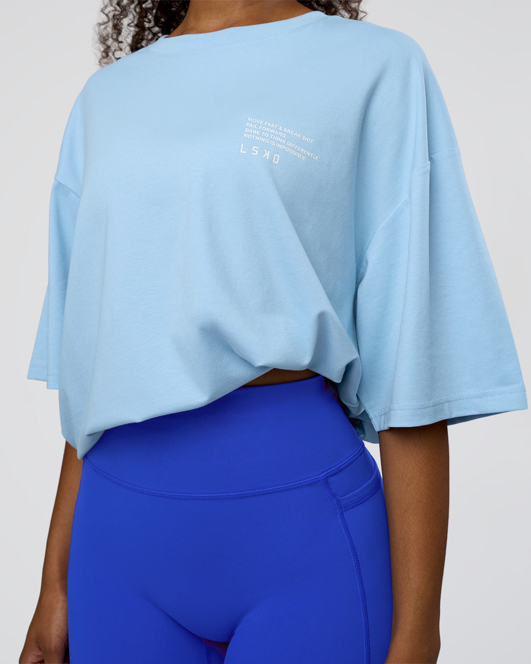 Woman wearing Coffee Run FLXCotton Oversized Tee - Open Air-White | Model:Jordan | Size:L - view 8