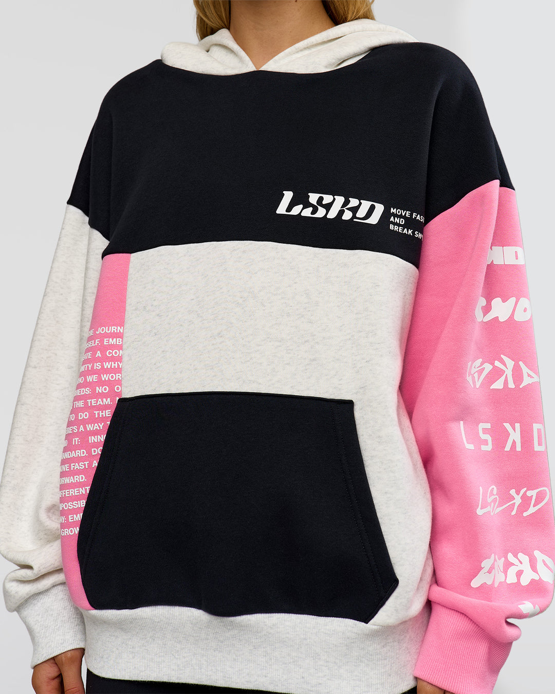 Woman wearing Deconstructed Fleece Hoodie - Caviar-Candy Pink-Grey Marl | Model:Leilani | Size:XS - view 15