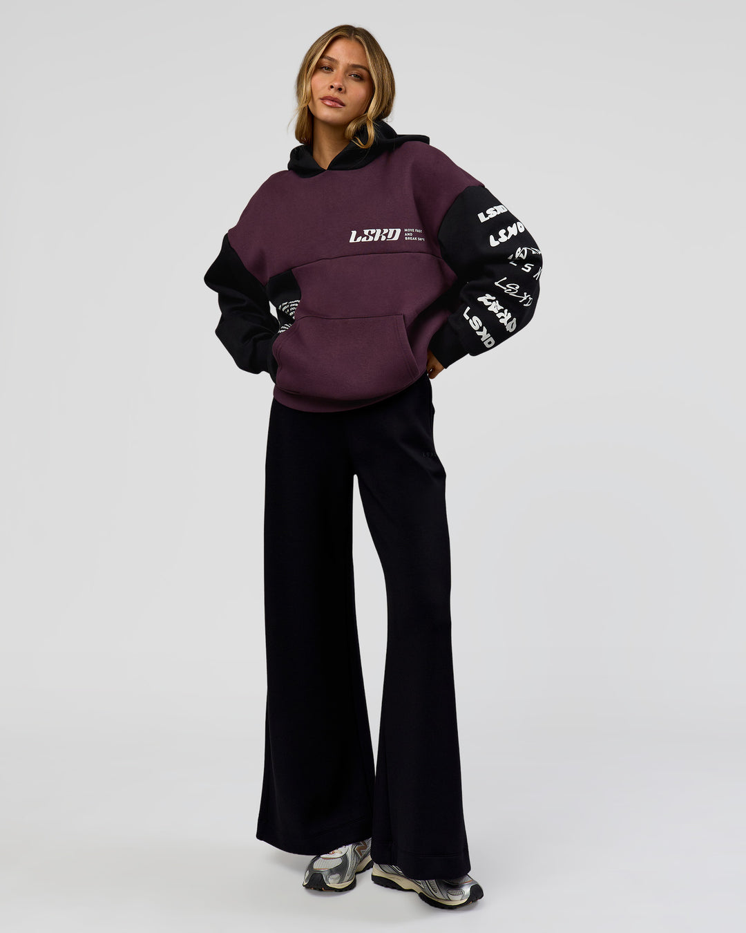Woman wearing Deconstructed Fleece Hoodie - Caviar-Midnight Plum | Model:Leilani | Size:XS - view 14