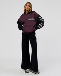 Woman wearing Deconstructed Fleece Hoodie - Caviar-Midnight Plum | Model:Leilani | Size:XS | Thumbnail Index: 13