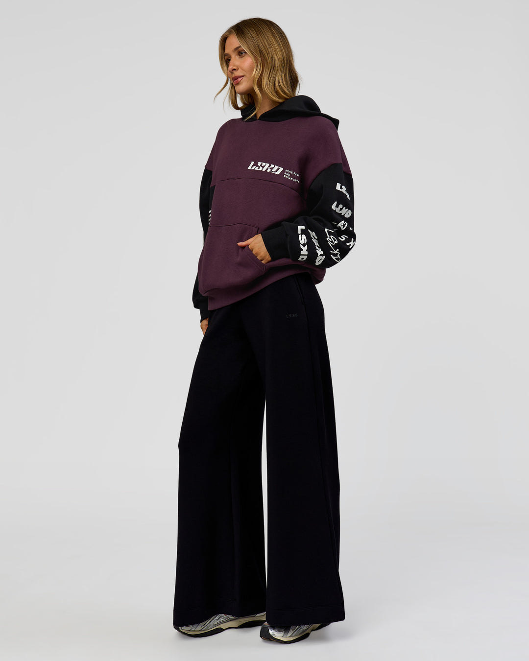 Woman wearing Deconstructed Fleece Hoodie - Caviar-Midnight Plum | Model:Leilani | Size:XS - view 8