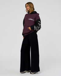 Woman wearing Deconstructed Fleece Hoodie - Caviar-Midnight Plum | Model:Leilani | Size:XS | Thumbnail Index: 7