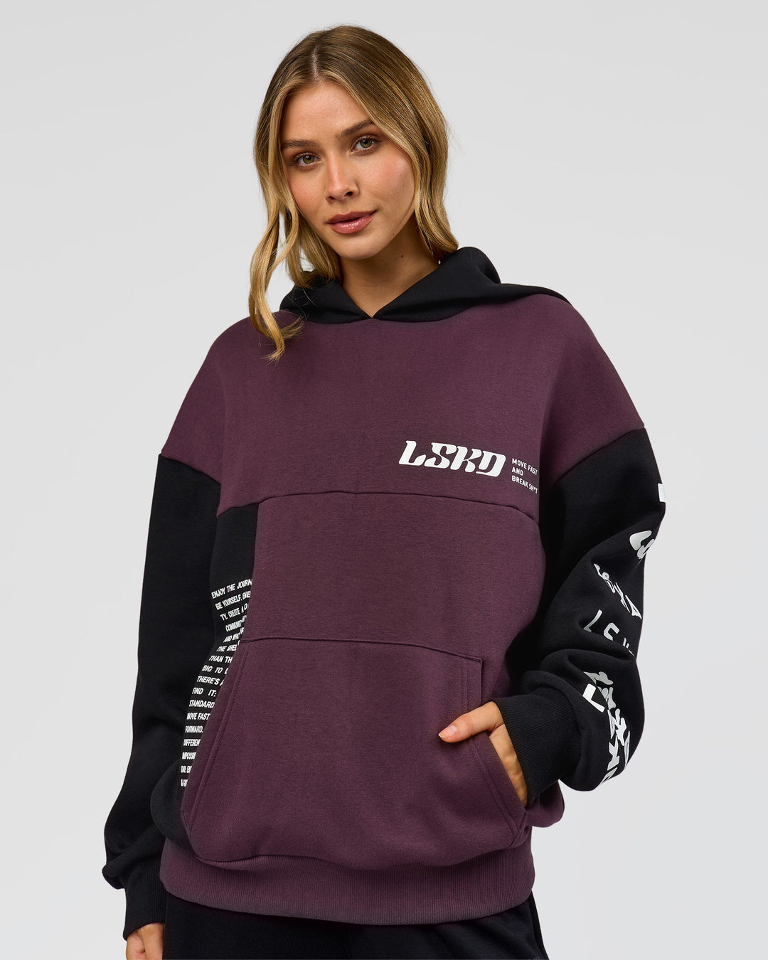 Woman wearing Deconstructed Fleece Hoodie - Caviar-Midnight Plum | Model:Leilani | Size:XS - view 4