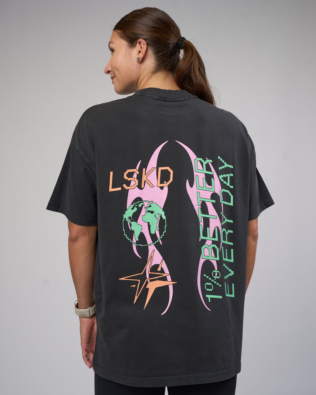 Woman wearing Digital World Heavyweight Oversized Tee - Washed Black | Model:Hannah | Size:XS - view 5