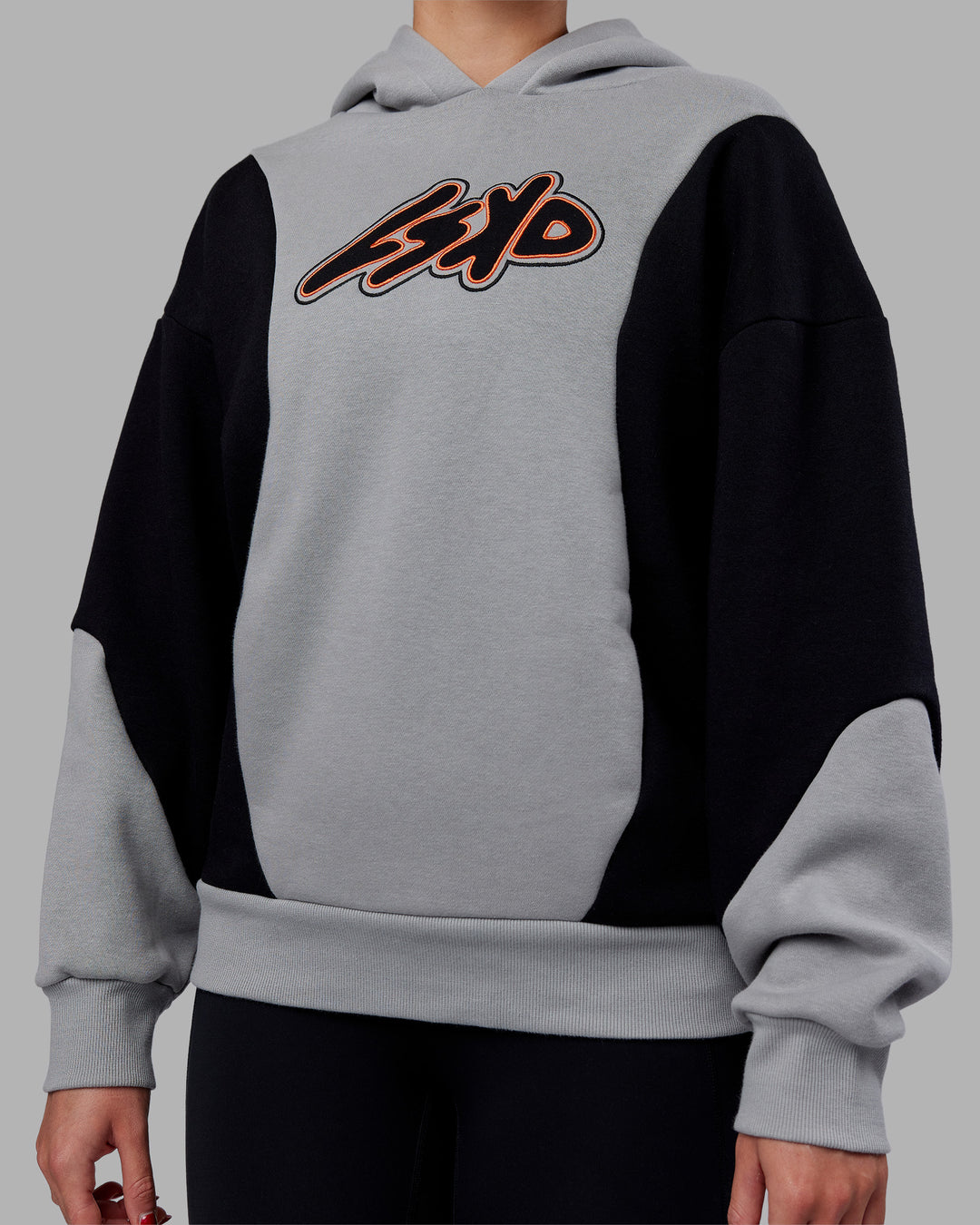Woman wearing Downtown Oversized Panel Hoodie - Circular Grey - Black | Model:Remmi | Size:XS - view 8