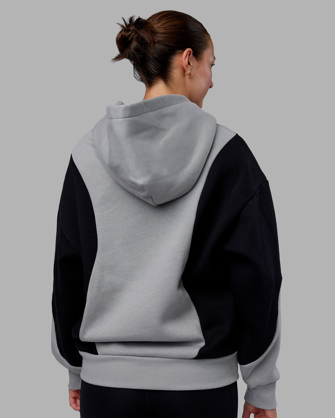 Woman wearing Downtown Oversized Panel Hoodie - Circular Grey - Black | Model:Remmi | Size:XS - view 7