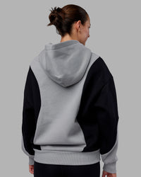 Woman wearing Downtown Oversized Panel Hoodie - Circular Grey - Black | Model:Remmi | Size:XS | Thumbnail Index: 6