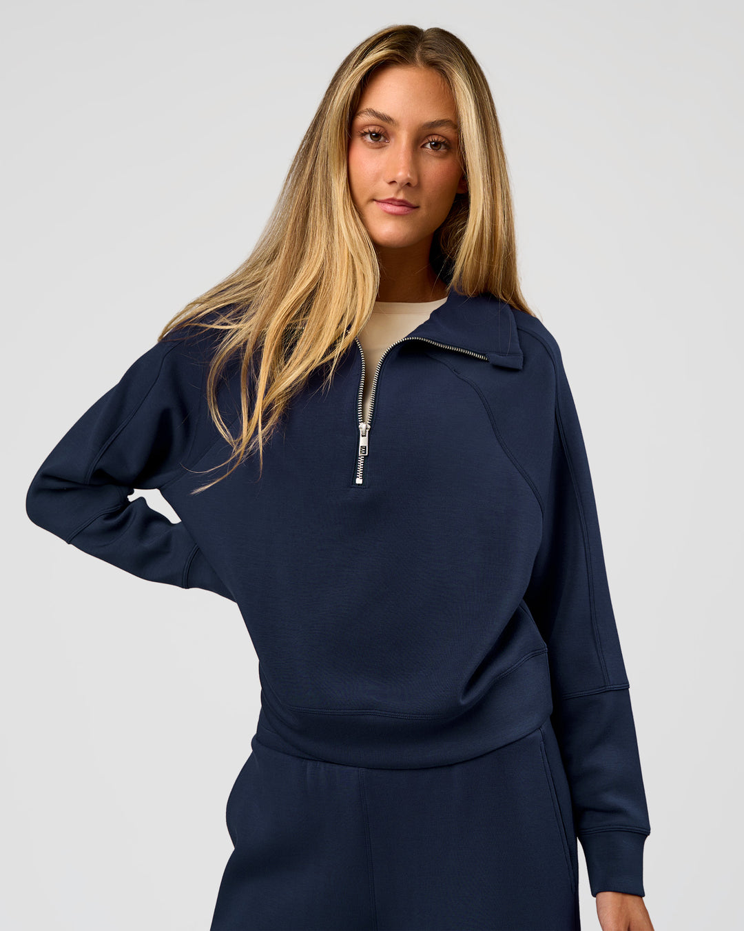 Woman wearing Elevate SoftTouch 1/2 Zip Sweater - Future Navy | Model:Georgia | Size:XS - view 1