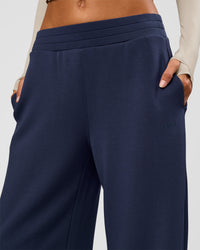Woman wearing Elevate SoftTouch Wide Leg Pant - Future Navy | Model:Georgia | Size:XS | Thumbnail Index: 2