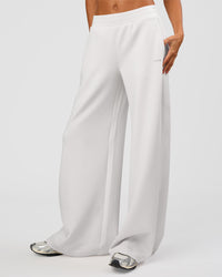 Woman wearing Elevate SoftTouch Wide Leg Pant Tall - Clay | Model:Georgia | Size:XS | Thumbnail Index: 1