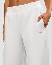 Woman wearing Elevate SoftTouch Wide Leg Pant Tall - Clay | Model:Georgia | Size:XS | Thumbnail Index: 2