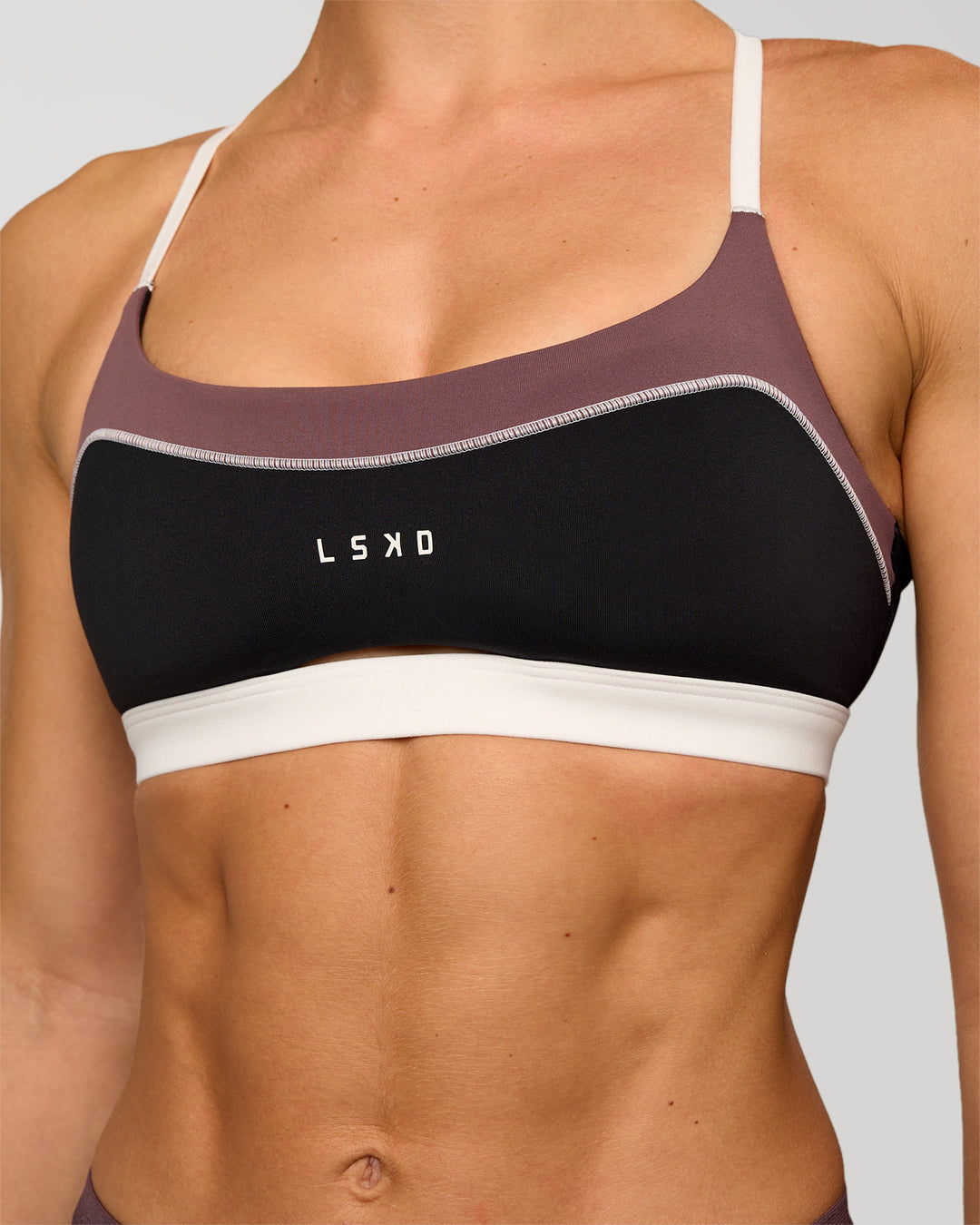 Man wearing Elevate Sports Bra - Black-Multi | Model:Maja | Size:XS - view 9