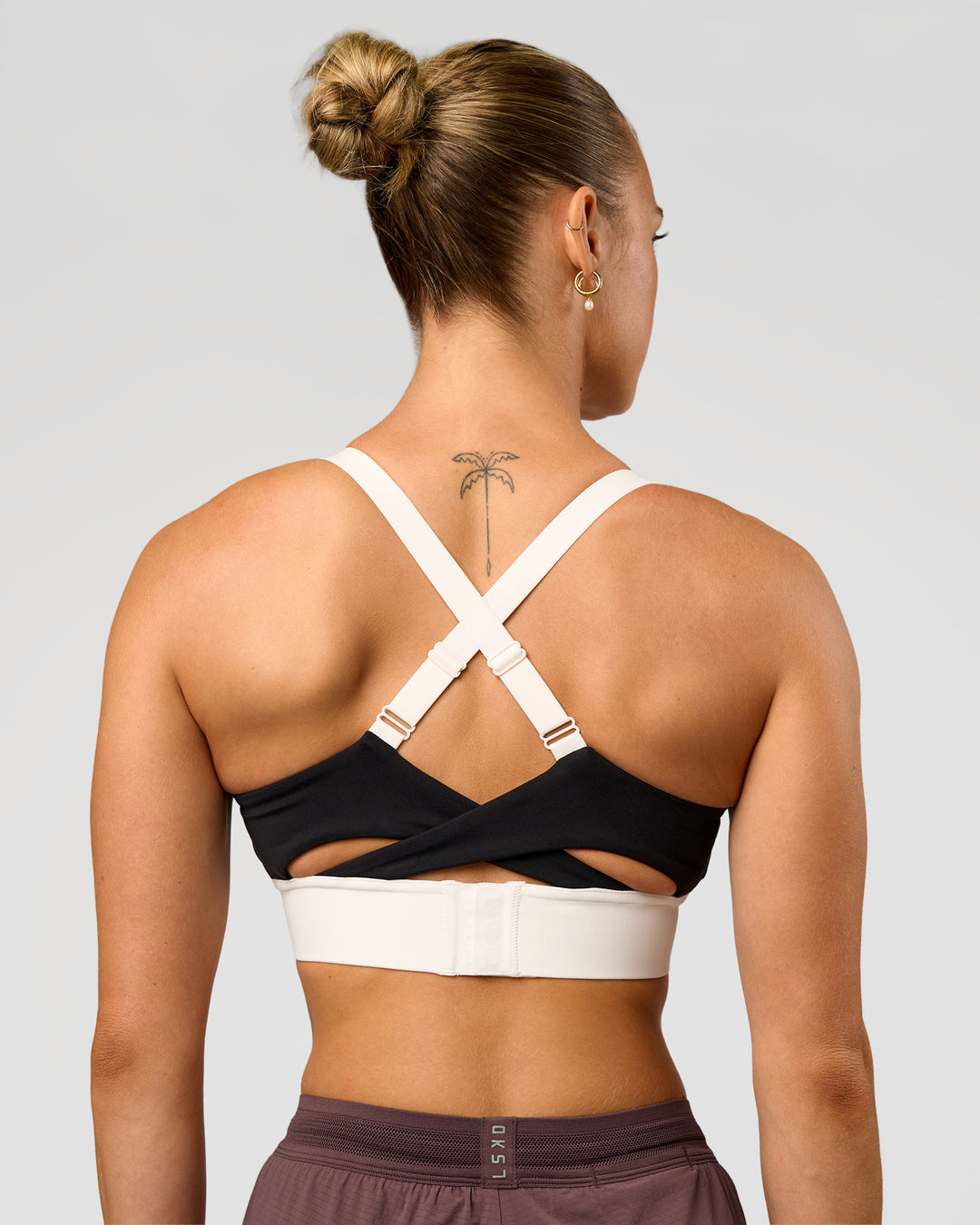 Woman wearing Elevated Accelerate Sports Bra - Black-Multi | Model:Maja | Size:XS - view 2