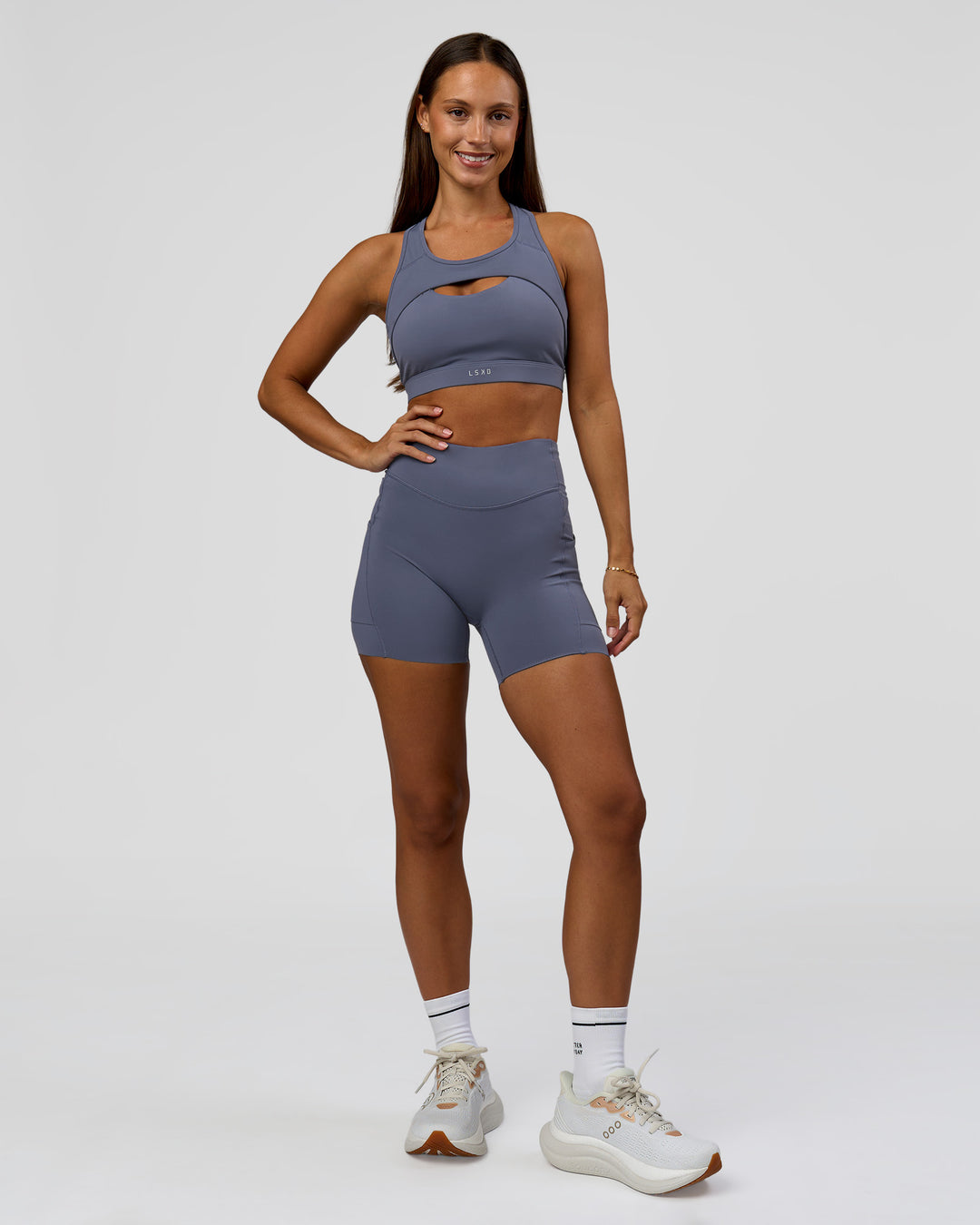 Woman wearing Elite Run High-Rise 5" Short Pockets - Night Shadow | Model:Brylee | Size:XS - view 6