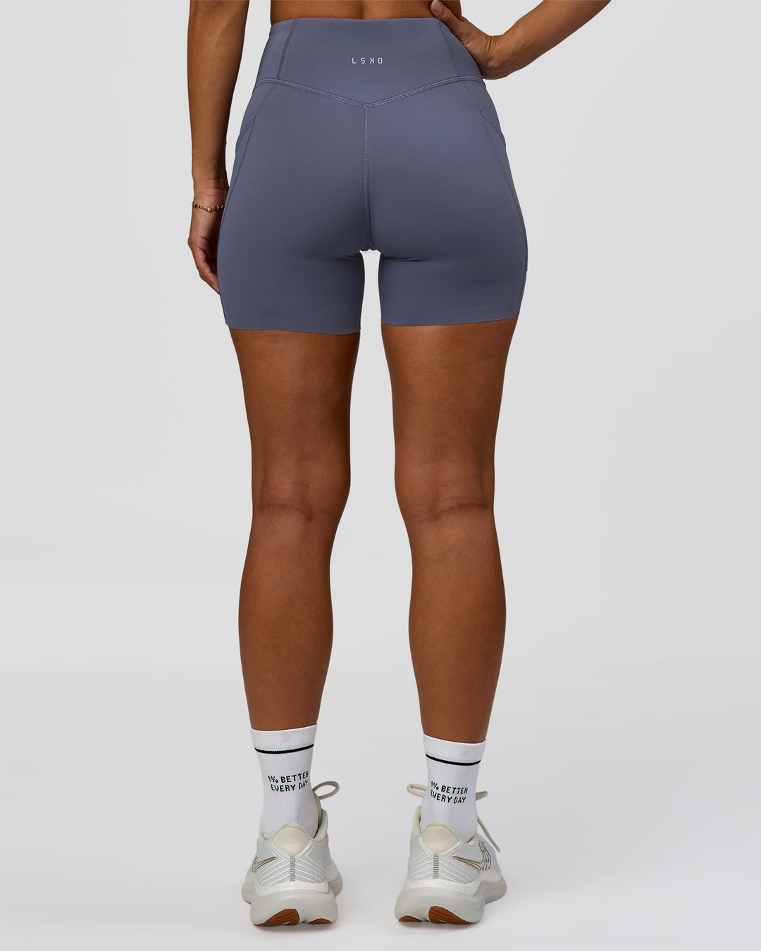 Woman wearing Elite Run High-Rise 5" Short Pockets - Night Shadow | Model:Brylee | Size:XS - view 5