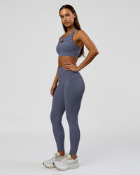 Woman wearing Elite Run High-Rise Full Length Legging Pockets - Night Shadow | Model:Brylee | Size:XS | Thumbnail Index: 5