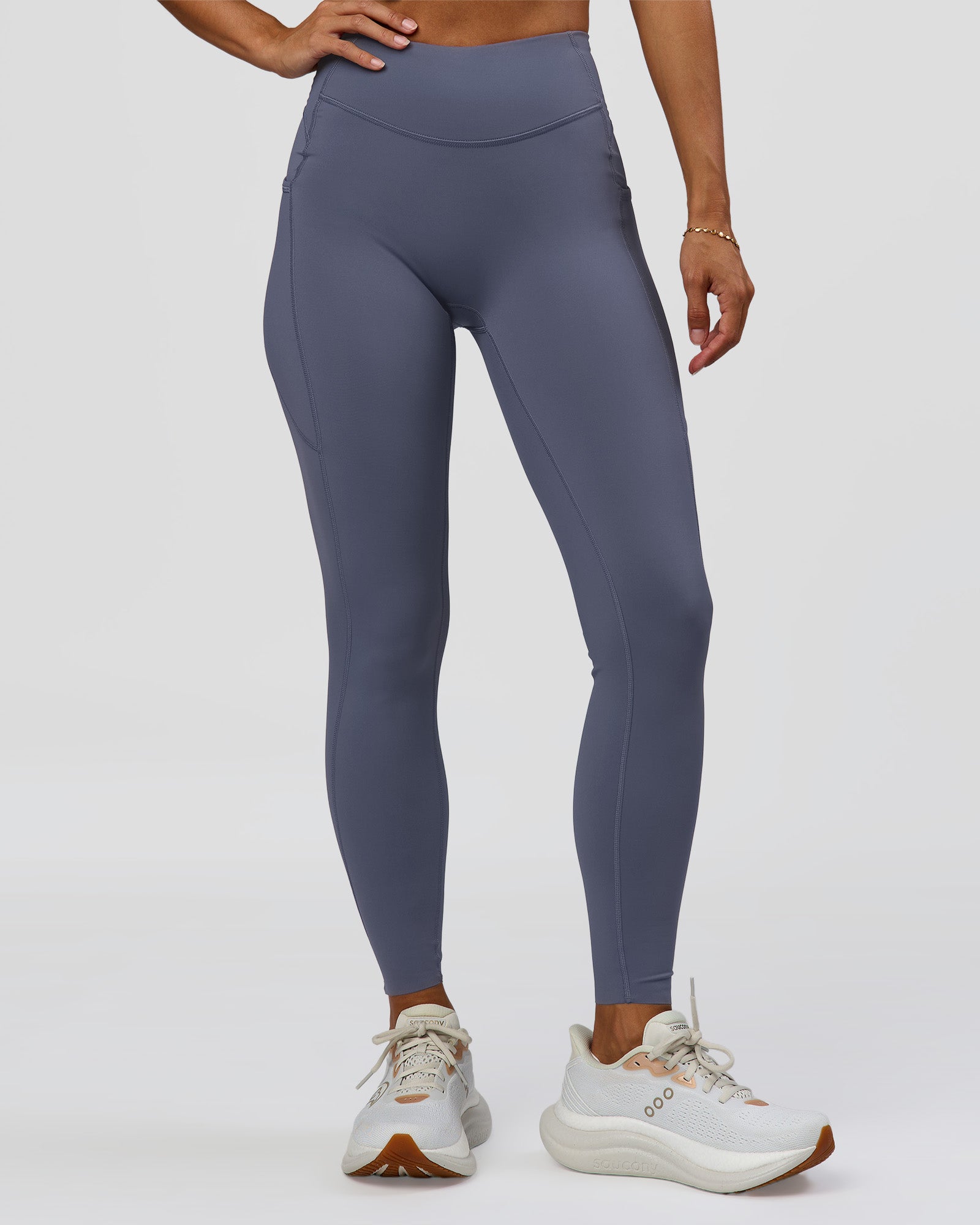 Woman wearing Elite Run High-Rise Full Length Legging Pockets - Night Shadow | Model:Brylee | Size:XS
