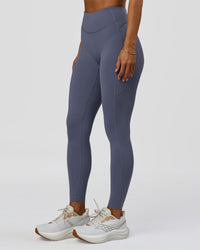 Woman wearing Elite Run High-Rise Full Length Legging Pockets - Night Shadow | Model:Brylee | Size:XS | Thumbnail Index: 6