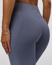 Woman wearing Elite Run High-Rise Full Length Legging Pockets - Night Shadow | Model:Brylee | Size:XS | Thumbnail Index: 7