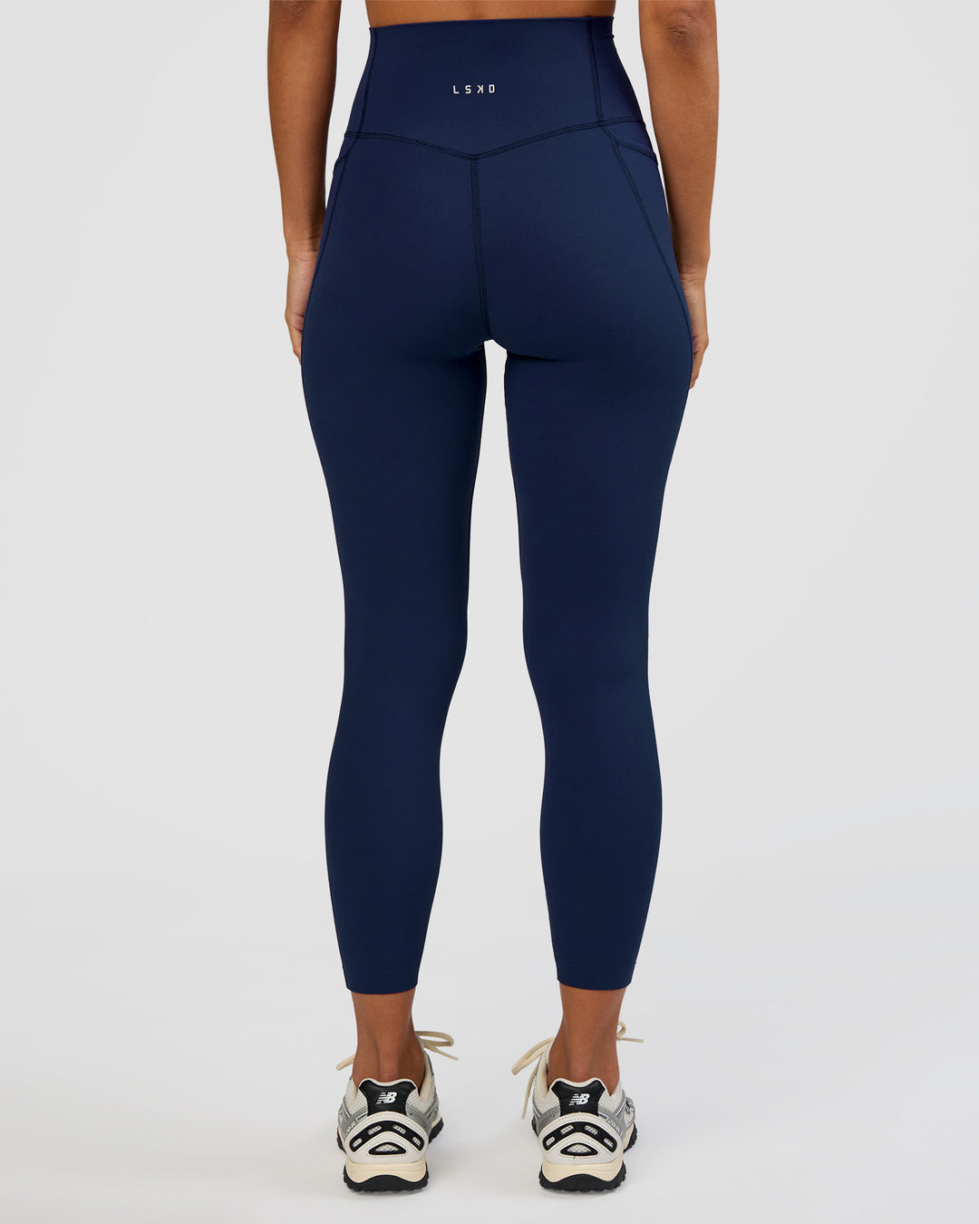 Woman wearing Elixir Ultra High-Rise 7/8 Legging Pockets - Future Navy | Model:Brylee | Size:XS - view 4