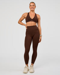 Woman wearing Elixir Ultra High-Rise 7/8 Legging Pockets - Hot Chocolate | Model:Maja | Size:XS | Thumbnail Index: 4