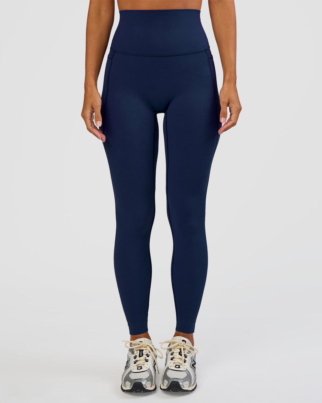 Woman wearing Elixir Ultra High-Rise Full Length Legging Pockets - Future Navy | Model:Brylee | Size:XS - view 5