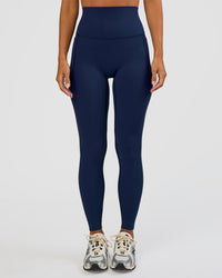 Woman wearing Elixir Ultra High-Rise Full Length Legging Pockets - Future Navy | Model:Brylee | Size:XS | Thumbnail Index: 4