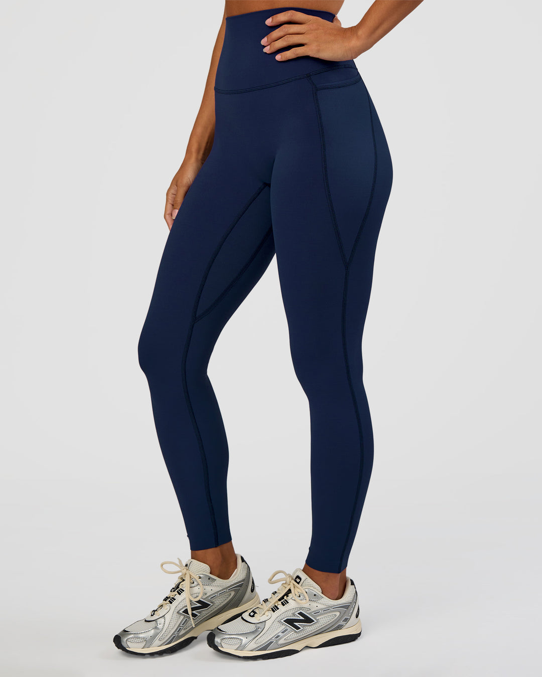 Woman wearing Elixir Ultra High-Rise Full Length Legging Pockets - Future Navy | Model:Brylee | Size:XS - view 7