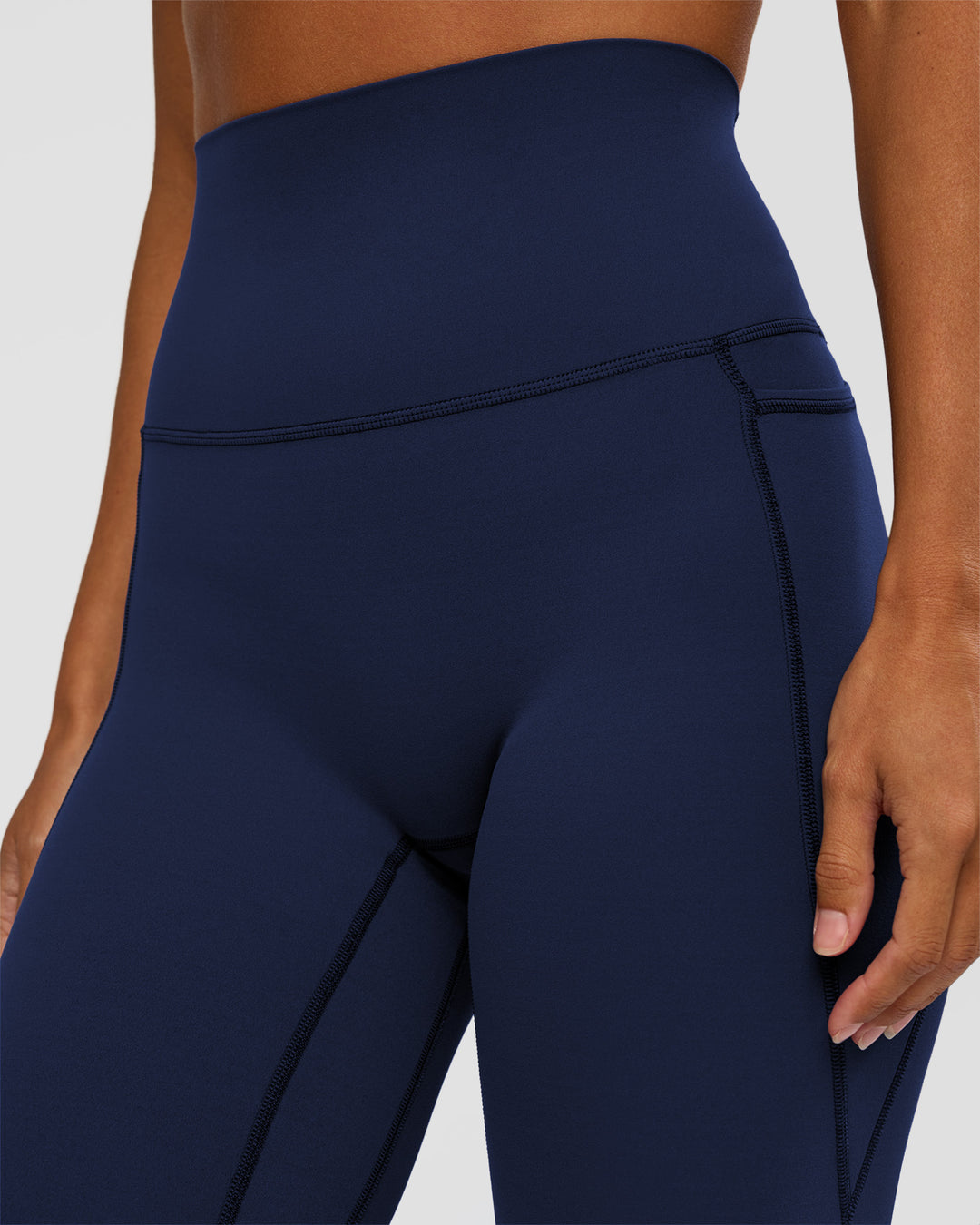 Woman wearing Elixir Ultra High-Rise Full Length Legging Pockets - Future Navy | Model:Brylee | Size:XS - view 8