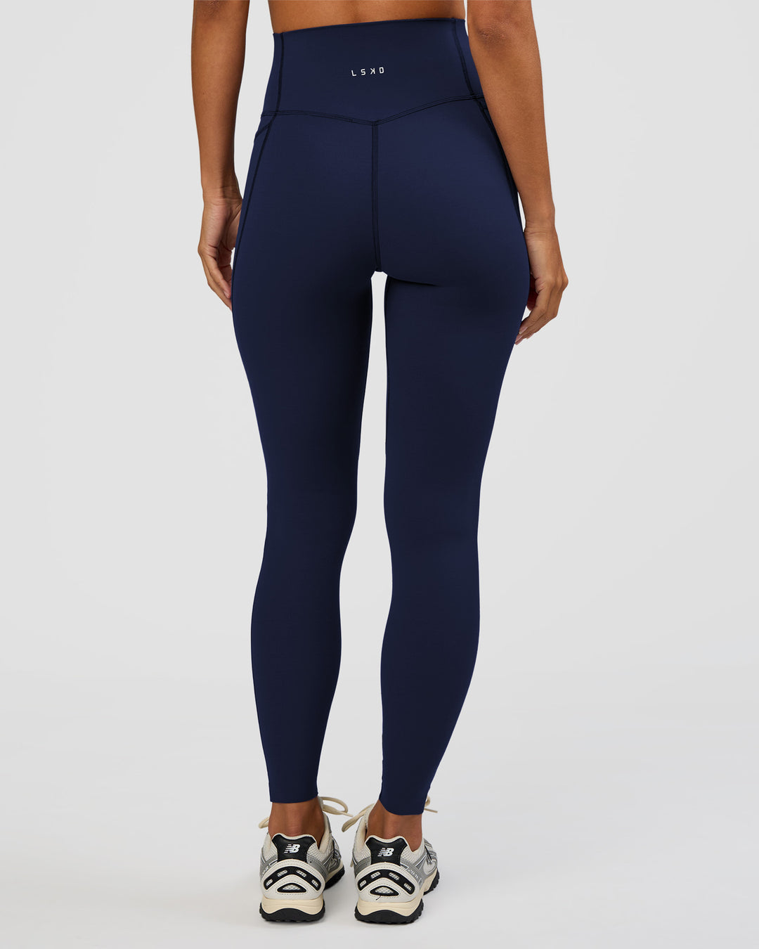 Woman wearing Elixir Ultra High-Rise Full Length Legging Pockets - Future Navy | Model:Brylee | Size:XS - view 3