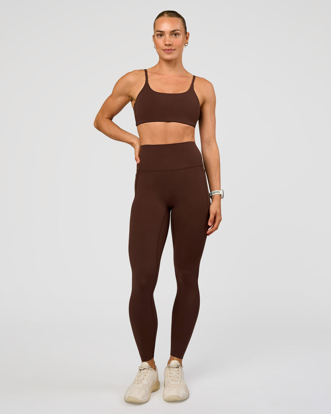 Woman wearing Elixir Ultra High-Rise Full Length Legging Pockets - Hot Chocolate | Model:Maja | Size:XS - view 8
