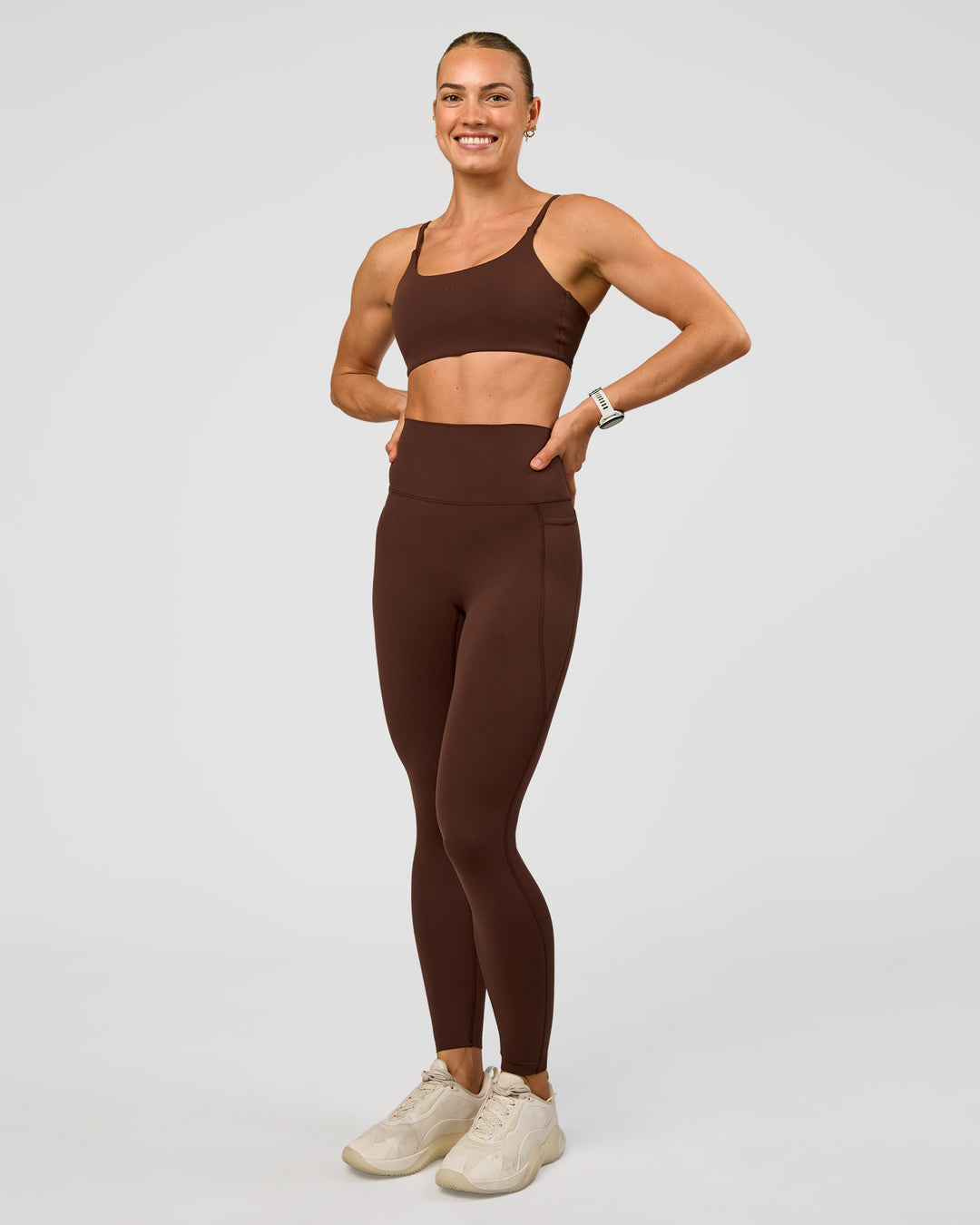 Woman wearing Elixir Ultra High-Rise Full Length Legging Pockets - Hot Chocolate | Model:Maja | Size:XS - view 6
