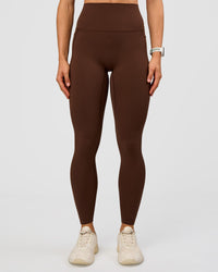 Woman wearing Elixir Ultra High-Rise Full Length Legging Pockets - Hot Chocolate | Model:Maja | Size:XS | Thumbnail Index: 4