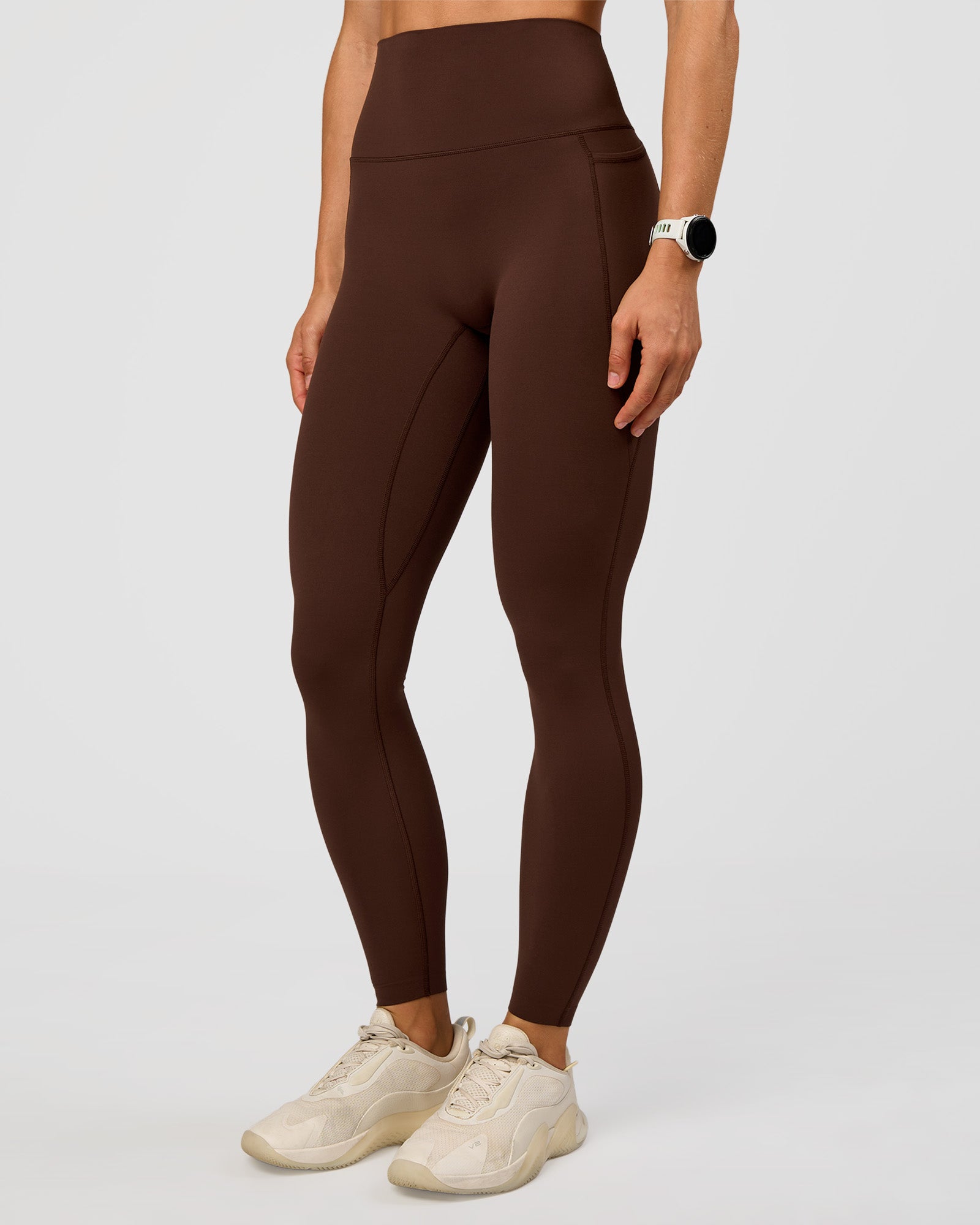 Woman wearing Elixir Ultra High-Rise Full Length Legging Pockets - Hot Chocolate | Model:Maja | Size:XS