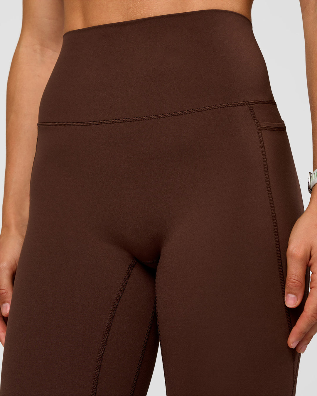 Woman wearing Elixir Ultra High-Rise Full Length Legging Pockets - Hot Chocolate | Model:Maja | Size:XS - view 9