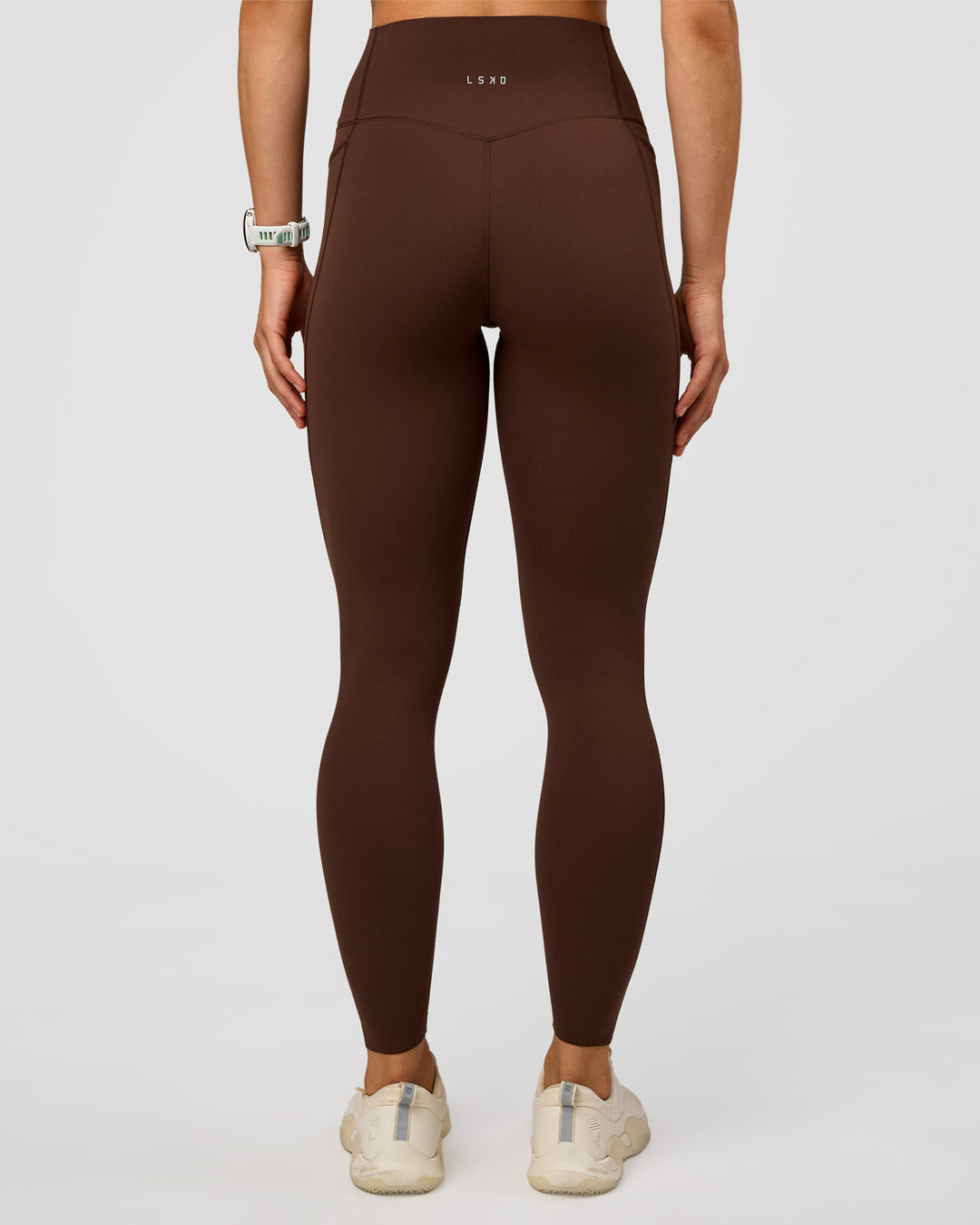 Woman wearing Elixir Ultra High-Rise Full Length Legging Pockets - Hot Chocolate | Model:Maja | Size:XS - view 3