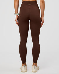 Woman wearing Elixir Ultra High-Rise Full Length Legging Pockets - Hot Chocolate | Model:Maja | Size:XS | Thumbnail Index: 2