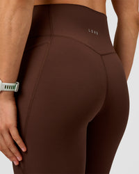 Woman wearing Elixir Ultra High-Rise Full Length Legging Pockets - Hot Chocolate | Model:Maja | Size:XS | Thumbnail Index: 6
