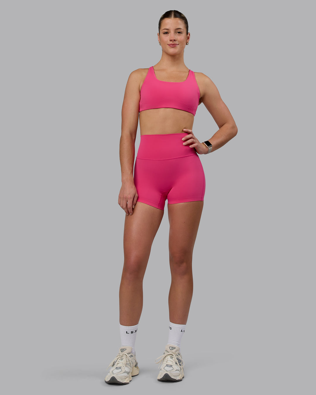 Woman wearing Elixir Ultra High-Rise 4" Short - Pink Flash | Model:Chloe | Size:XS - view 8