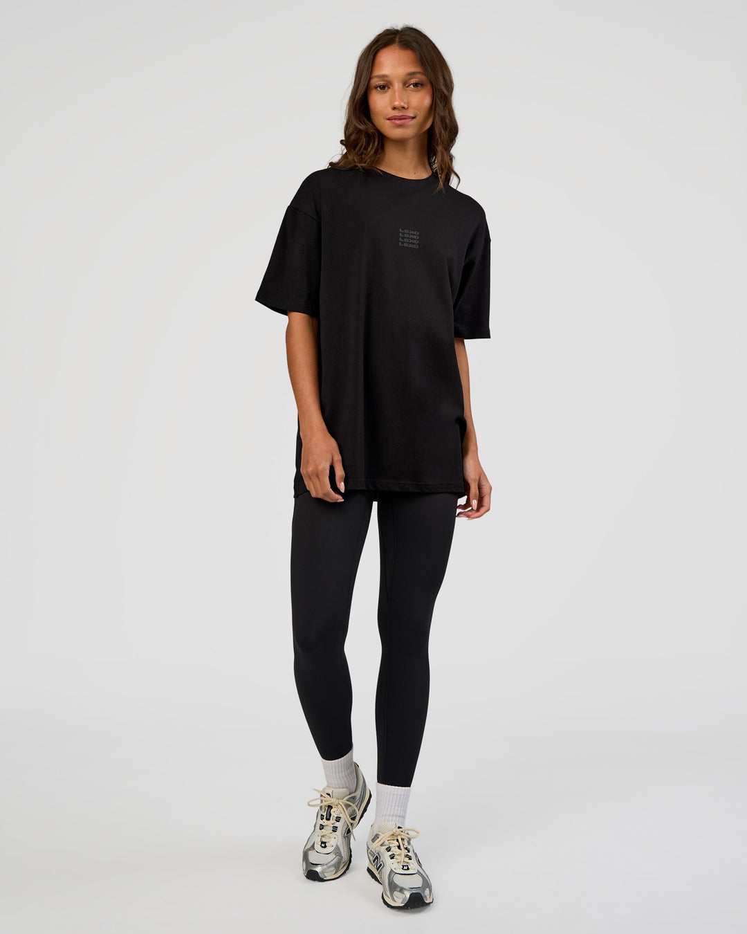 Woman wearing Everyday Elevation FLXCotton Oversized Tee - Black-Black | Model:Dakota | Size:XS - view 11