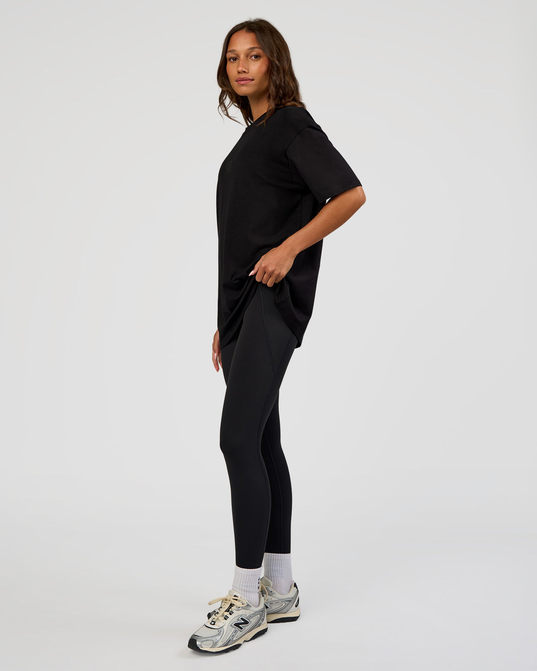 Woman wearing Everyday Elevation FLXCotton Oversized Tee - Black-Black | Model:Dakota | Size:XS - view 8