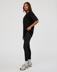 Woman wearing Everyday Elevation FLXCotton Oversized Tee - Black-Black | Model:Dakota | Size:XS | Thumbnail Index: 7